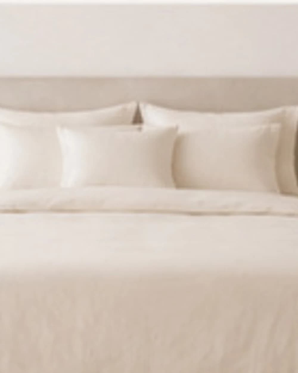 Soft grey duvet in a pale bedroom