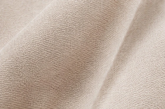 Close-up of woven cotton percale fabric in warm beige